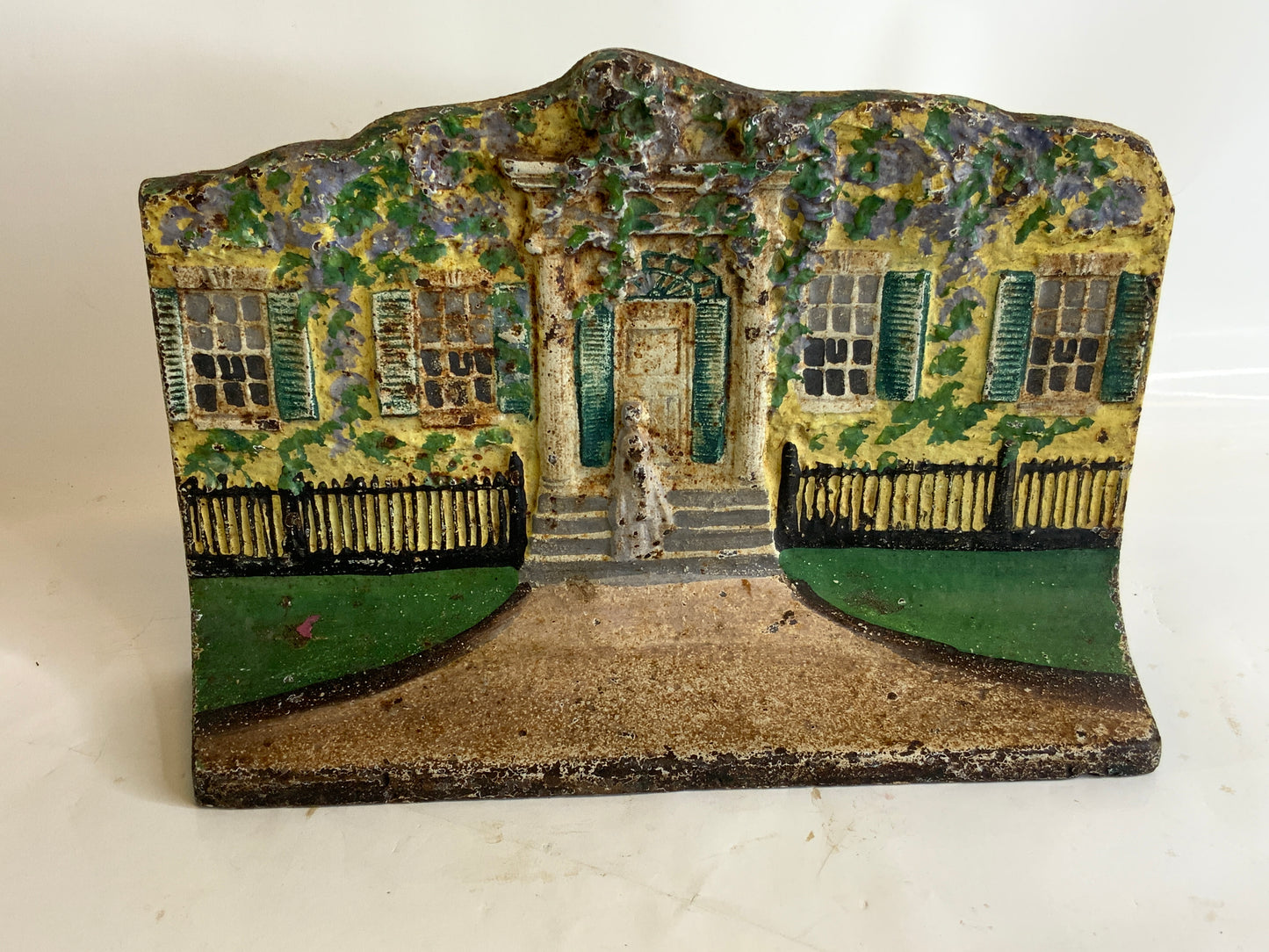 Antique Cast Iron "House with Woman" Doorstop